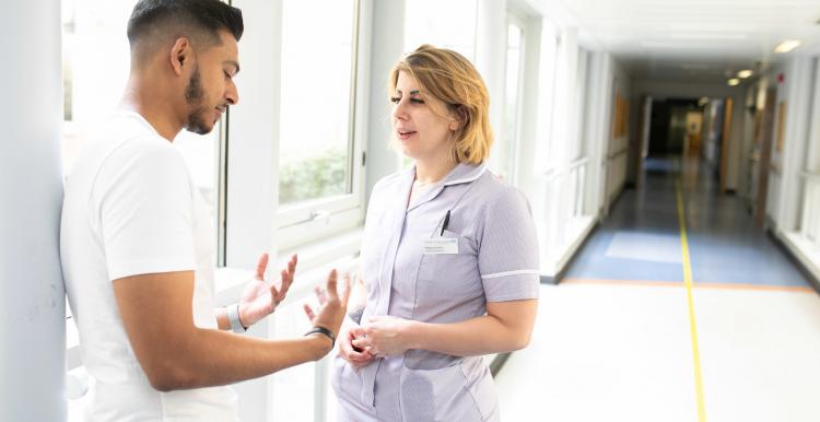 Man talking to a nurse