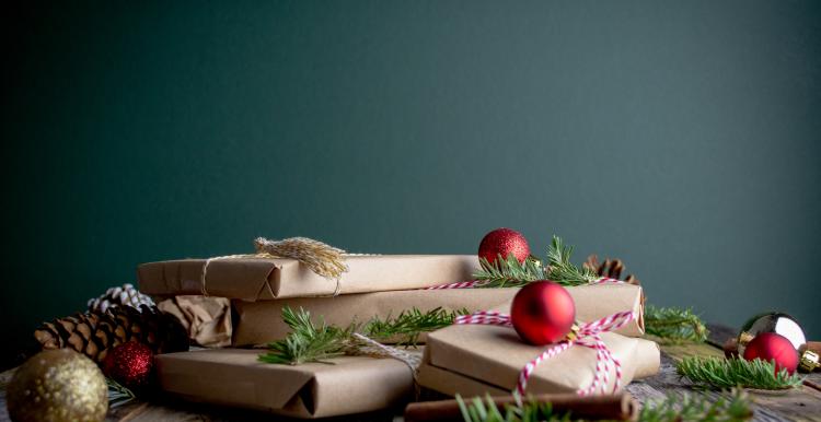 Christmas gifts wrapped in brown paper