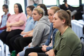 Young people listening in a group