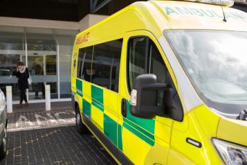Ambulance parked up in front of hospital 