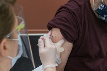 Patient receiving Covid vaccination