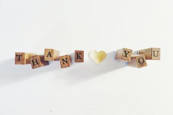 Thank you text spelt out in wooden blocks