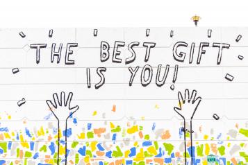 graffiti wall that says the best gift if you