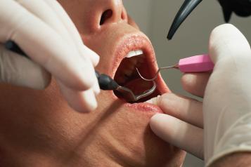 Patient receiving dental treatment