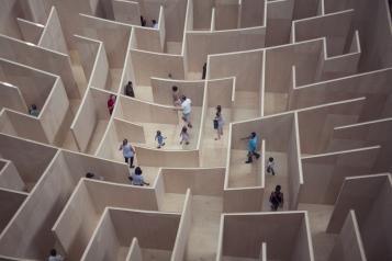 People walking through a maze