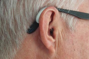 man with hearing aid