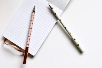 Pens and paper for questions and answers