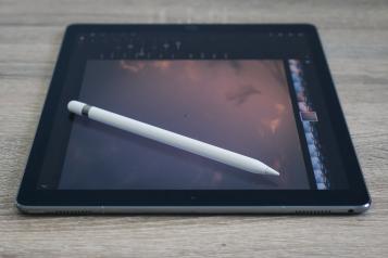 Tablet computer on the table with a view of the sky onscreen