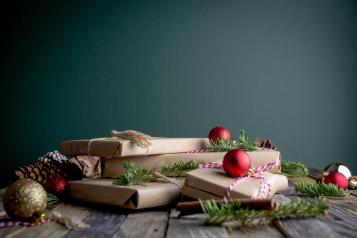 Christmas gifts wrapped in brown paper