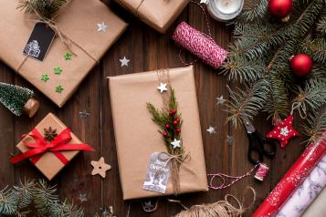 Photo of Christmas presents, ribbons and wreaths