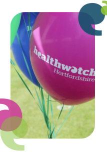 Healthwatch Hertfordshire written on a pink balloon